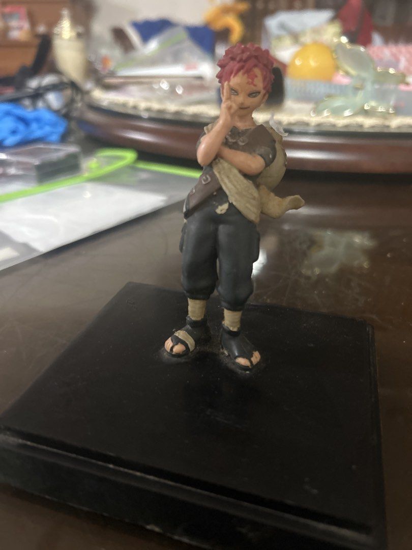 Naruto Gaara Action Figure (Category: Figurines & Statues) located in Manila. Submitted by _abcag (Listing ID 1452240308, Image 1). Description: - Gaara action figure from Naruto - Comes with a black display base - Features signature red hair and forehead symbol - Wears his usual outfit with a sack on his back - Ideal for any Naruto fan's collection.
