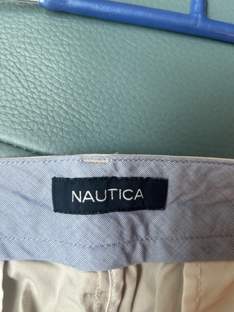 NAUTICA 卡其色長褲 （分類：長褲）位於 Hong Kong。 由 beatles5 提交（商品編號 1452139298，圖片 3）。簡介： 呢條係 NAUTICA 卡其色長褲款。前面有鈕扣同拉鍊，後面有兩個袋。褲頭有 NAUTICA 牌子標籤。著落好舒服，適合日常著用。 （新舊如圖） 尺寸 : 腰圍32 cm，長度34 cm。