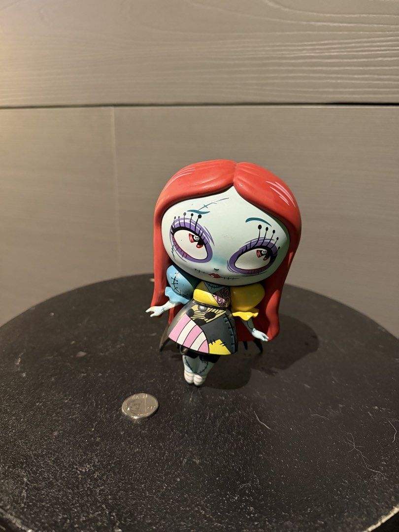 Nightmare Before Christmas Sally Figure (Category: Figurines & Statues) located in Mandaluyong City. Submitted by clawset (Listing ID 1452280397, Image 1). Description: - Adorable Sally figure from The Nightmare Before Christmas. - Features her iconic patchwork dress design. - A must-have for any fan of the movie. - Stands on its own for easy display. - Compact size, approximately the size of a coin..