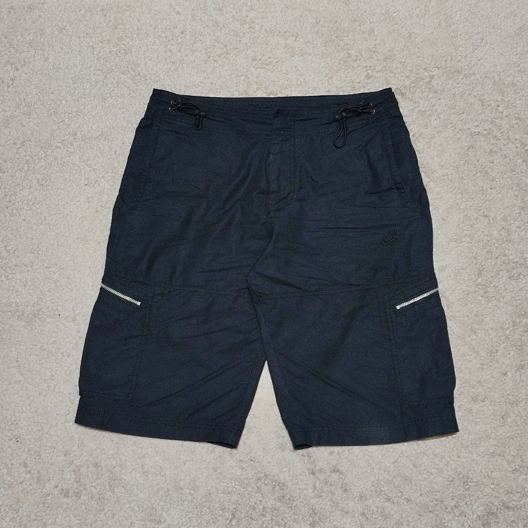 Nike Cargo Shorts Black Zip Pockets Drawstring Waist (Category: Shorts) located in Manila. Submitted by anthonig (Listing ID 1452263463, Image 1). Description: Color is solid black Length: 22 inches Width: 31 inches Hem: 10 inches Price: 600 pesos Condition: 9.8/10 Issues: none PM if interested or for inquiries Meetups within MANILA only Can do shipping at buyers expense .