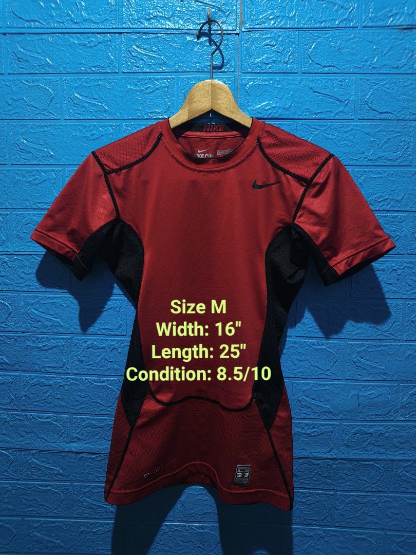 Nike Pro Combat Dri-Fit Red Compression T-Shirt Size M (Category: Activewear) located in Davao. Submitted by vndrgd (Listing ID 1452244522, Image 1). Description: - Red Nike Pro Combat Dri-Fit T-shirt - Compression Fit - Size: Medium (M) - Measurements: 16" width, 25" length - Ideal for workouts and sports.