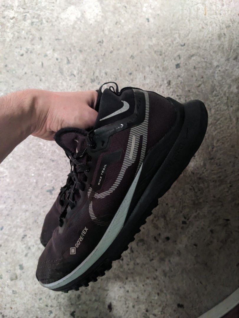 Nike React Trail Pegasus 4 Gore-Tex Running Shoes (Category: Sneakers) located in Manila. Submitted by mrln13 (Listing ID 1452206082, Image 2). Description: - Nike Trail Running Shoes - Size: US 9.5 - Color: Black with reflective details - Features: Gore-Tex for waterproof protection - Ideal for: Trail running, wet conditions - Condition: Soles show some wear but retain good grip. Laces intact. - Ready for your next adventure! #nike #gtx.#goretex