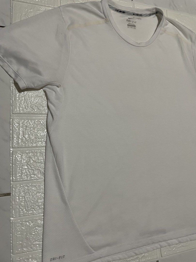 Nike Running Miler DriFIT Mesh Tee (Category: Activewear) located in Marilao. Submitted by clear_out_closet (Listing ID 1452141588, Image 3). Description: Item Details: 👇 • Brand: Nike • Color: White • Model Name: Nike Running Miler Dri-FIT Technical Mesh Tee • Material: 100% Polyester (Dri-FIT Mesh) • Size: XXL (Extra Extra Large) fits L/XL Condition & Features: •Authentic Nike Running performance tee in clean white condition •Lightweight, high