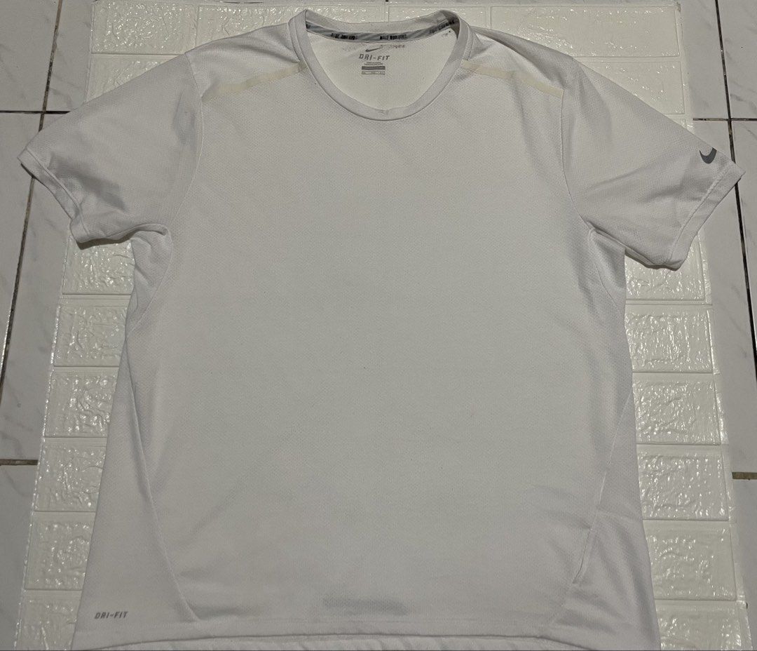 Nike Running Miler DriFIT Mesh Tee (Category: Activewear) located in Marilao. Submitted by clear_out_closet (Listing ID 1452141588, Image 1). Description: Item Details: 👇 • Brand: Nike • Color: White • Model Name: Nike Running Miler Dri-FIT Technical Mesh Tee • Material: 100% Polyester (Dri-FIT Mesh) • Size: XXL (Extra Extra Large) fits L/XL Condition & Features: •Authentic Nike Running performance tee in clean white condition •Lightweight, high