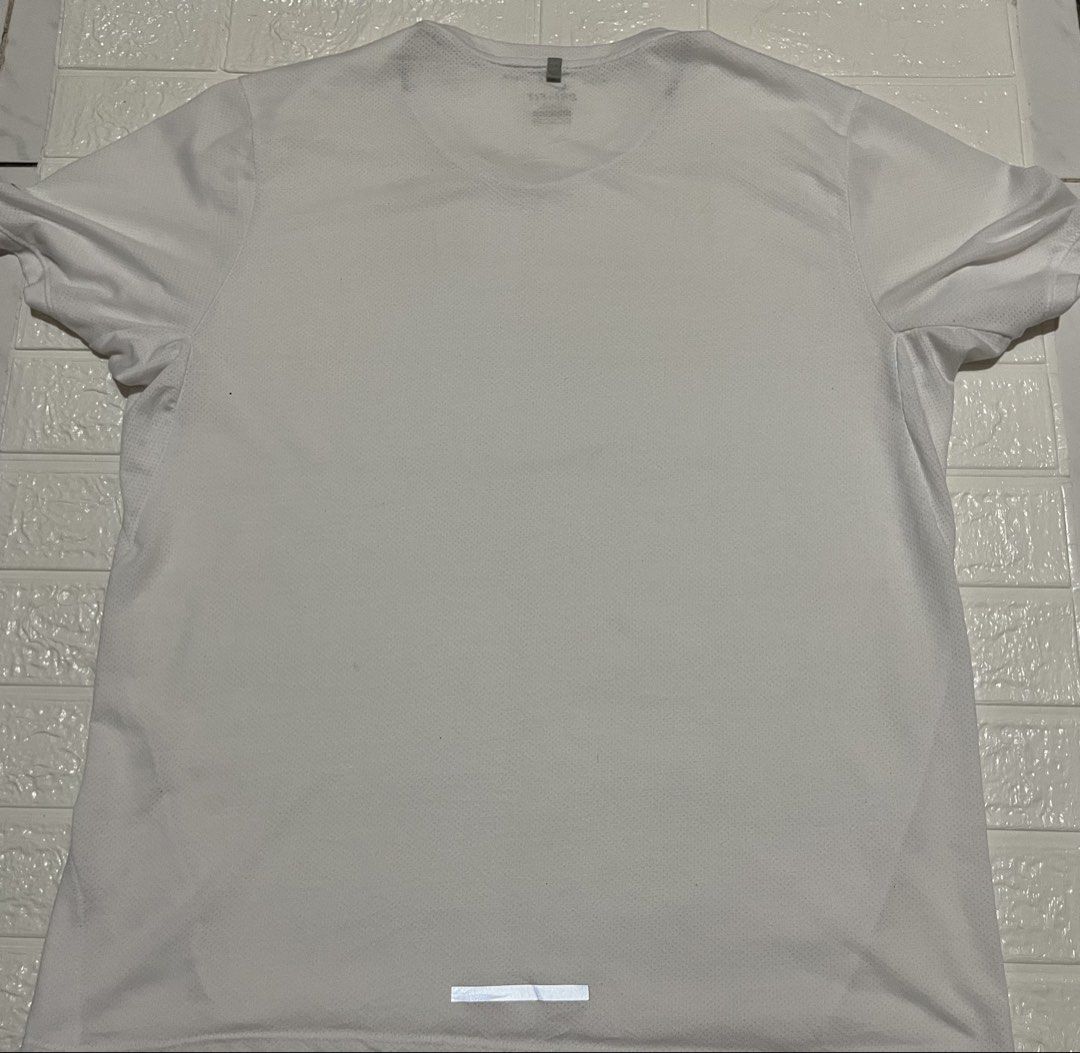 Nike Running Miler DriFIT Mesh Tee (Category: Activewear) located in Marilao. Submitted by clear_out_closet (Listing ID 1452141588, Image 2). Description: Item Details: 👇 • Brand: Nike • Color: White • Model Name: Nike Running Miler Dri-FIT Technical Mesh Tee • Material: 100% Polyester (Dri-FIT Mesh) • Size: XXL (Extra Extra Large) fits L/XL Condition & Features: •Authentic Nike Running performance tee in clean white condition •Lightweight, high