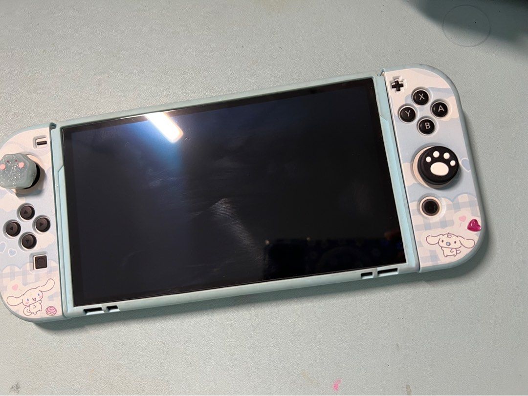 Nintendo switch oled- complete with box and accessories (Category: Nintendo) located in San Pablo. Submitted by anshinsuru (Listing ID 1452115418, Image 1). Description: For sale Nintendo switch oled with downloaded games bought in orange app, all working -Nintendo sports -NBA 26K -Yoshi's world -Mario Kart infinity -Mario Party Jamboree -Super Mario Odyssey -The witcher Bought own digital games -Overcooked -Cottonville -Sherlock Holmes The Awake