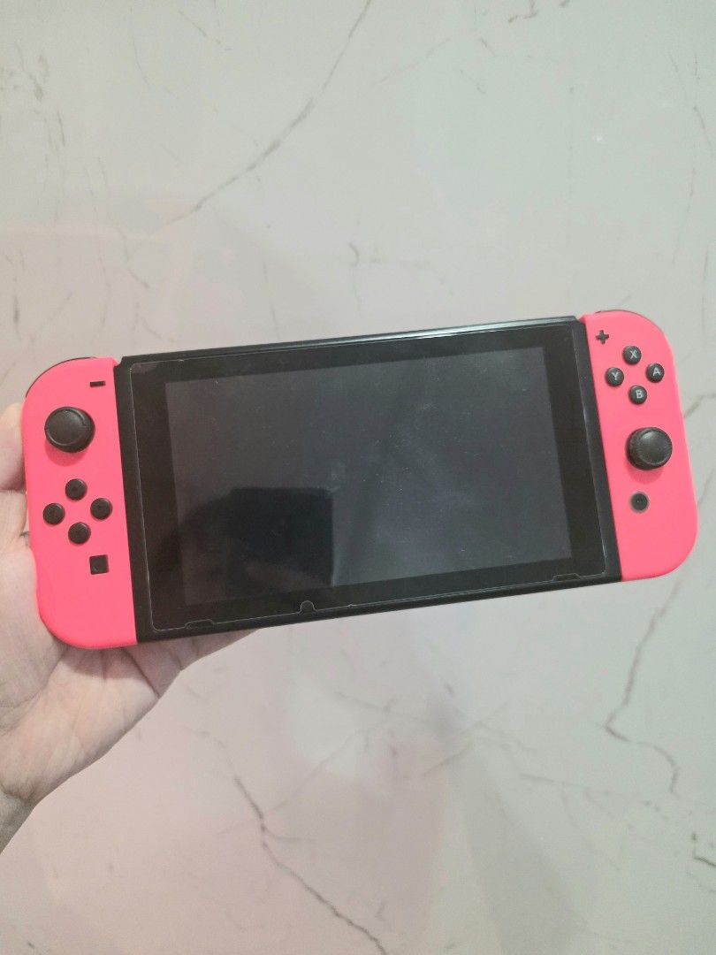 Nintendo Switch Version 1 Red Joycons Mario Edition (Category: Nintendo) located in Mandaluyong City. Submitted by chan.ningtatum (Listing ID 1452126744, Image 2). Description: For Sale! Nintendo Switch Version 1 - Original Red Mario Joycons included - Clear screen and responsive buttons - Ready for your favorite games Good Working Condition. Tested Working Checkouts via Shope e and Laz ada Available Shipping: Lalamove, Grab Meet ups: Mandaluyong