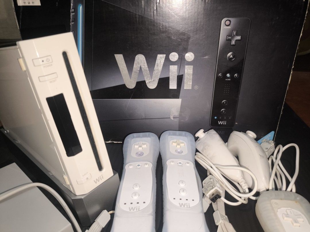 NINTENDO WII COMPLETE SET + BALANCE BOARD (Category: Nintendo) located in Manila. Submitted by rarepenguin.68a06c (Listing ID 1452268259, Image 3). Description: No issue plug and play Inclusion: Wii 2HDMI 2 - Wii remote 2 - Nun chuks 1 - Power Brick (100v-245v) 2 - Wii Sensor Bar 1 Console 1 Standard AV Cable 2gb Memory Card for HOMEBREW.