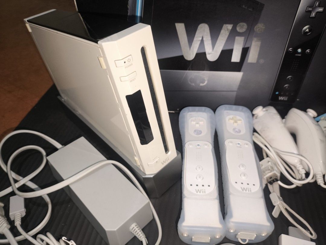 NINTENDO WII COMPLETE SET + BALANCE BOARD (Category: Nintendo) located in Manila. Submitted by rarepenguin.68a06c (Listing ID 1452268259, Image 2). Description: No issue plug and play Inclusion: Wii 2HDMI 2 - Wii remote 2 - Nun chuks 1 - Power Brick (100v-245v) 2 - Wii Sensor Bar 1 Console 1 Standard AV Cable 2gb Memory Card for HOMEBREW.