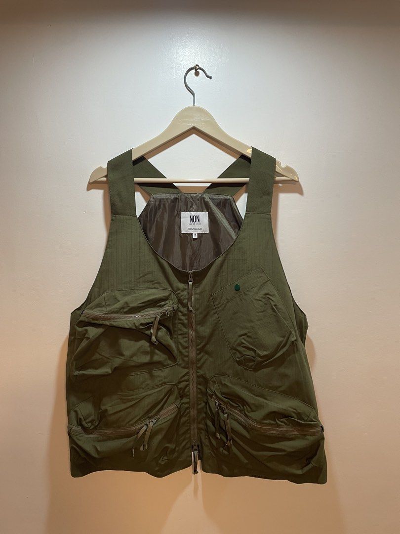 NON NOW OR NEVER Olive Green Multipocket Utility Vest Size 2 (Category: Vests) located in Bacolod City. Submitted by moboandmoga (Listing ID 1452265280, Image 3). Description: NON NOW OR NEVER Olive Green Multipocket Utility Vest (Ripstop fabric) Size 2 Small to Medium (Boxy fit) 10/10 Condition! - Olive green utility vest - Brand: NON NOW OR NEVER - Multiple pockets with zip closures - Front zipper closure - Herringbone fabric texture - Ideal fo