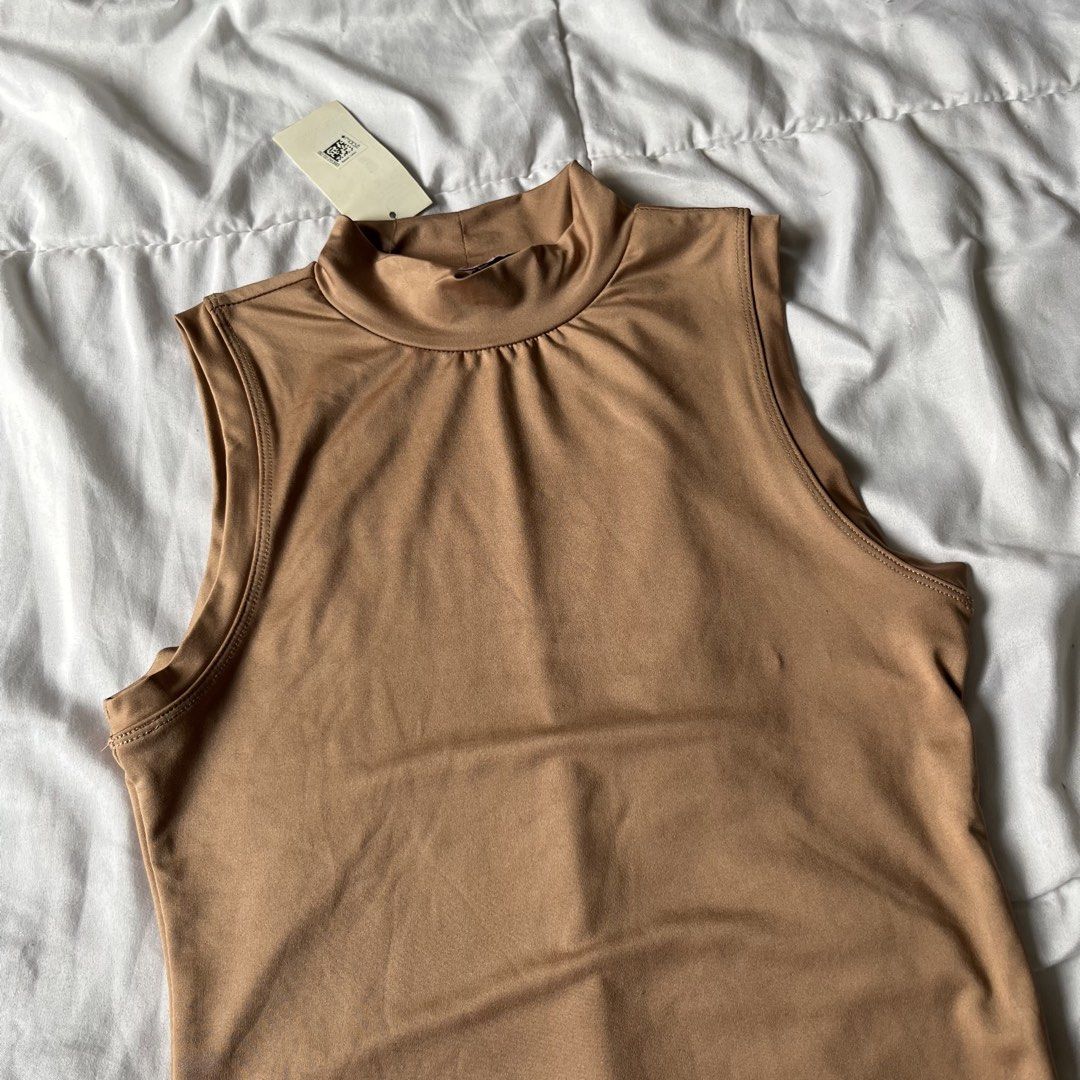 Nude High Neck Body Suit (Category: Others Tops) located in Davao. Submitted by byeooool (Listing ID 1452224938, Image 2). Description: - bought from macy's in the states - xs on tag but can fit up to small - double lined - stretchable - never been used rfs: not my style.