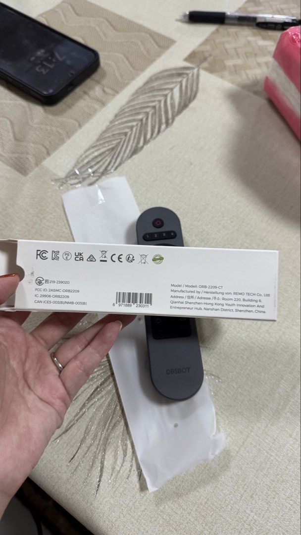 OBSBOT Remote Control (Category: Security Systems & CCTV Cameras) located in Singapore. Submitted by waffleandmuffins123 (Listing ID 1452229122, Image 2). Description: - OBSBOT remote control - Compatible with PTZ cameras - Features tracking and zoom buttons - Comes in original packaging - Ideal for camera setup control.