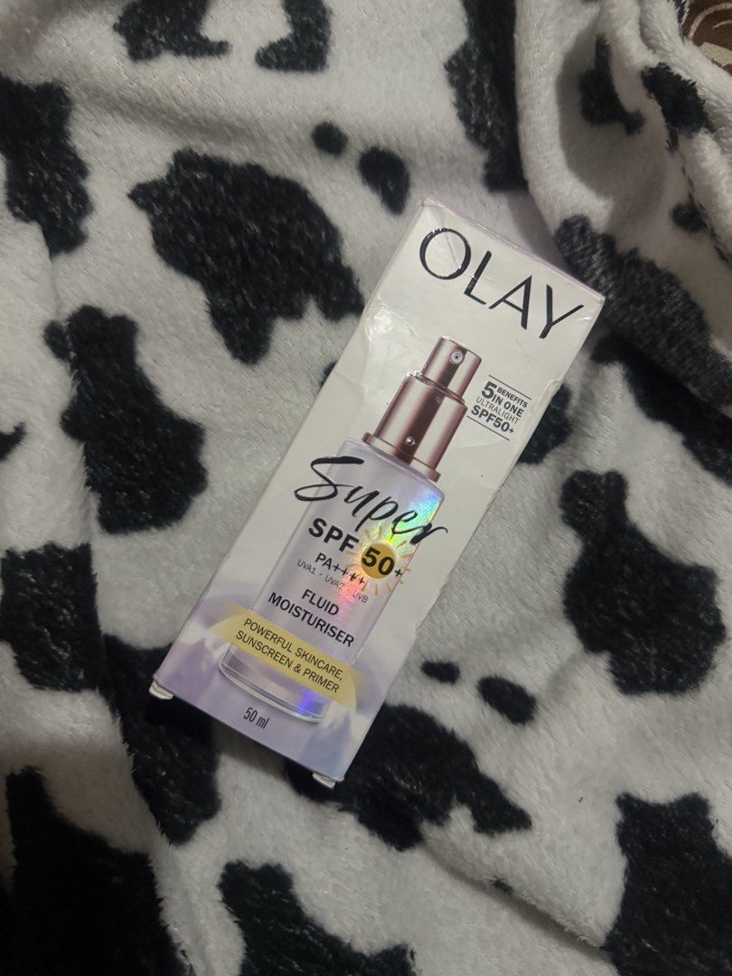 Olay Super SPF 50+ Fluid Moisturiser (Category: Face Care) located in Manila. Submitted by lexie.xoxo (Listing ID 1452284765, Image 1). Description: - Olay Super Fluid Moisturiser with SPF 50+ - Ultralight 5-in-1 formula - Provides powerful skincare - Acts as a sunscreen with SPF 50+ - Works as a primer - 50ml bottle - Ideal for daily use.