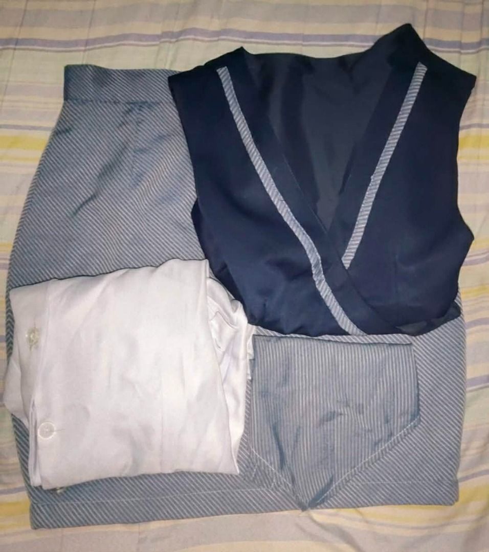 OLFU Female Internation Tourism Uniform (Category: Sets or Coordinates) located in Manila. Submitted by kaialberich (Listing ID 1452264230, Image 1). Description: FOR SALE: OLFU Pre-loved XS Female Internation Tourism Management Uniforms - Travel and Tour Operations ✨ 1 set (white sleeves, vest, scarf, skirt) ✨ Two complete sets available SIZES • blouse: XS • bust: 30-32 inches • skirt: XS • waistline: 22-24 inches • length: 17 inches CONDITION -