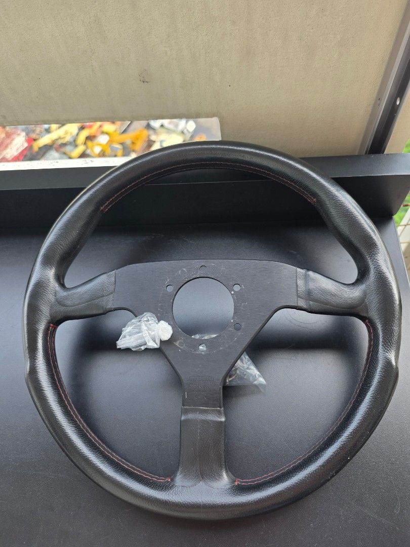 Original Momo Montecarlo (Category: Steering, Brakes, Control Parts and Accessories) located in Manila. Submitted by sound.solution (Listing ID 1452105557, Image 2). Description: original momo montecarlo red stitch with limited edition black horn.