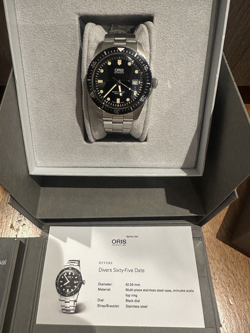 ORIS Divers Sixty-Five Date 42mm Automatic – Complete Set (Category: Men's Watches) located in Manila. Submitted by hb1118 (Listing ID 1452299369, Image 1). Description: Selling my Oris Divers Sixty-Five Date 42mm Automatic in excellent condition. A timeless vintage-inspired Swiss dive watch that wears beautifully both casually and formally. Specifications: * 42mm stainless steel case * Black dial with vintage lume * Automatic Swiss movement * St