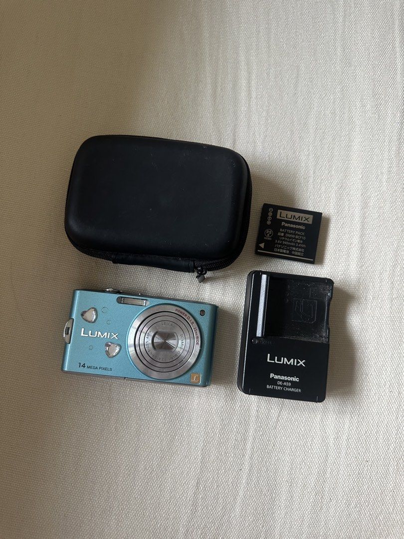 Panasonic Lumix DMC-FX66 (Category: Cameras) located in Iloilo. Submitted by denisenoelle (Listing ID 1452197359, Image 2). Description: - Teal Panasonic Lumix digital camera - 14 Megapixels - Leica lens (!!!!) - Inclusions: charger, battery & case - Screen displays in Japanese (but easy to navigate) - Tested and confirmed working - Menu with automatic camera settings - can send more test shots by request - really trusty cam, had a great time sho
