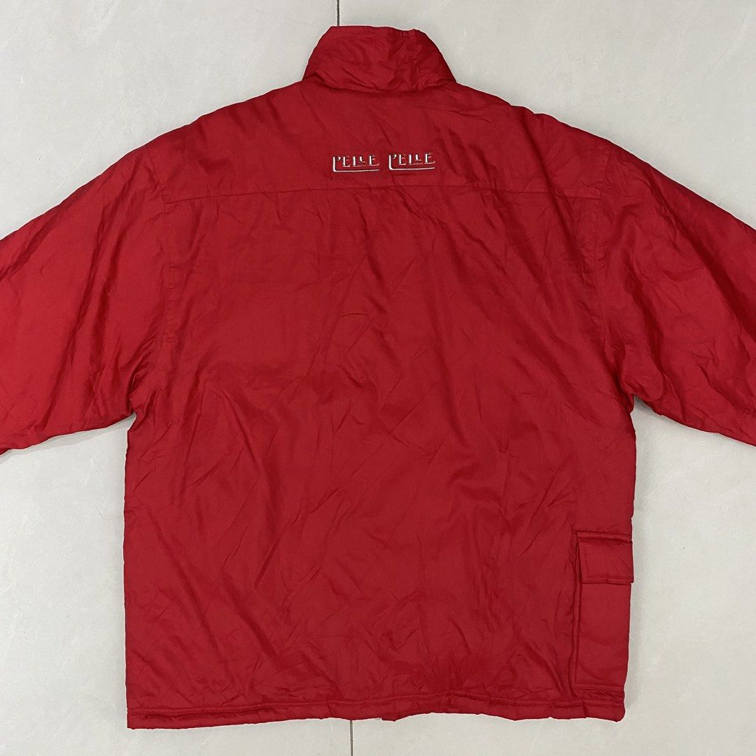 Pelle Pelle Red Puffer Jacket (Category: Coats, Jackets and Outerwear) located in Cavite. Submitted by mana__ (Listing ID 1452280972, Image 2). Description: - Stylish red Pelle Pelle jacket - Features a convenient zip pocket on the chest - Adds detail with zip accents on the sleeves - Minor marks on the front, clearly shown in photos - Ideal for keeping warm and stylish - Looking for a new owner to enjoy it! - XL Width - 26.8 Length - 32 Shoulder