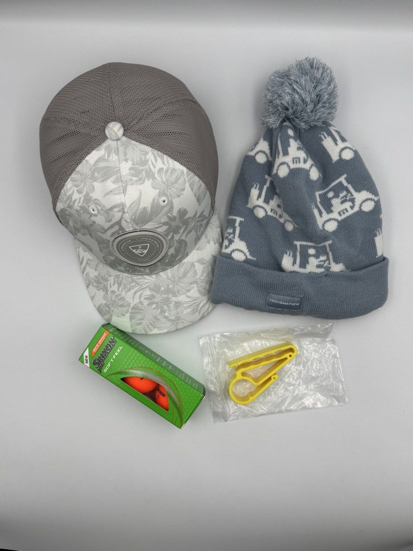 PGA Store Golf Accesories (Category: Golf) located in Manila. Submitted by mysticstar_d67ad3_tree (Listing ID 1452178886, Image 2). Description: Extra items on hand - Callaway cap and Travis Mathew bonnet are both from PGA Store in the US. - Cap was only used in a 30 minute car drive. - Knitted Beanie was never used. - Golf balls and cigar cart holder from local merchants also never used. - All items have been cleaned. .