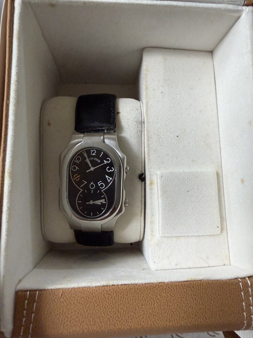 Philip Stein Dual Time Zone Watch (Category: Luxury Watches) located in Manila. Submitted by declutter_with_cmb (Listing ID 1452136668, Image 3). Description: - Philip Stein Dual Time Zone Watch - Need to change strap - Comes with original box, warranty, and care information - Ideal for frequent travelers or anyone managing multiple time zones - Unique and stylish design .