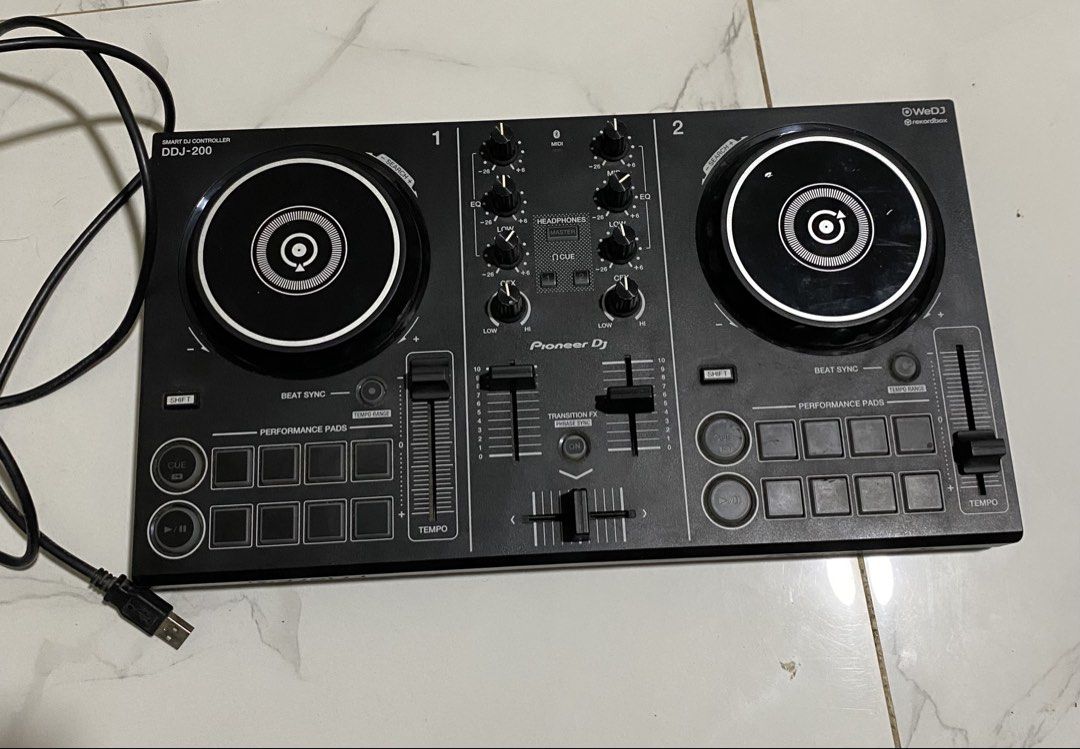 Pioneer DJ DDJ-200 Smart DJ Controller (Category: Other Audio Equipment) located in Manila. Submitted by donskehh (Listing ID 1452154750, Image 1). Description: - Pioneer DDJ-200 Smart DJ Controller - Compatible with WeDJ and Rekordbox - Features two jog wheels, performance pads, and tempo sliders - USB powered for easy setup - Ideal for beginners and practice on the go - Tested and confirmed working.