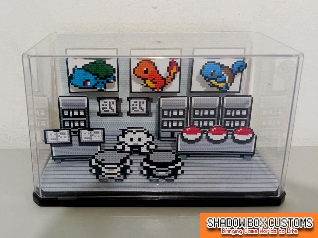 Pokemon Gen 1 (Red/Blue) Starters Mini Diorama Shadow Box (Category: Nintendo) located in Quezon City. Submitted by natzuki10 (Listing ID 1452174873, Image 1). Description: Pokemon Gen 1 (Red/Blue) Starters Mini Diorama Shadow Box Height: 4 inches Width: 6.50 inches *Handmade Pixel Shadow Boxes *Accepting Customized Designs *Perfect for Gamers & Collectors #videogames #roomdecor #collection #gamer #gift.