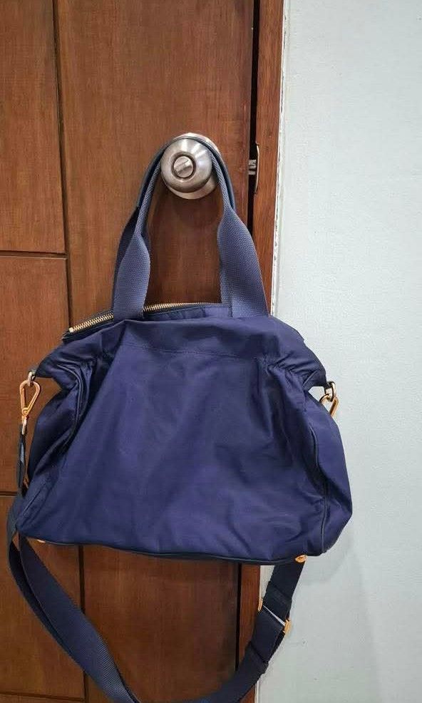 Prada Tessuto nylon 2 way (Category: Luxury Bags & Wallets) located in Passi. Submitted by janbelisario (Listing ID 1452160848, Image 2). Description: Well used conditions GUARANTEED ORIGINAL jj.