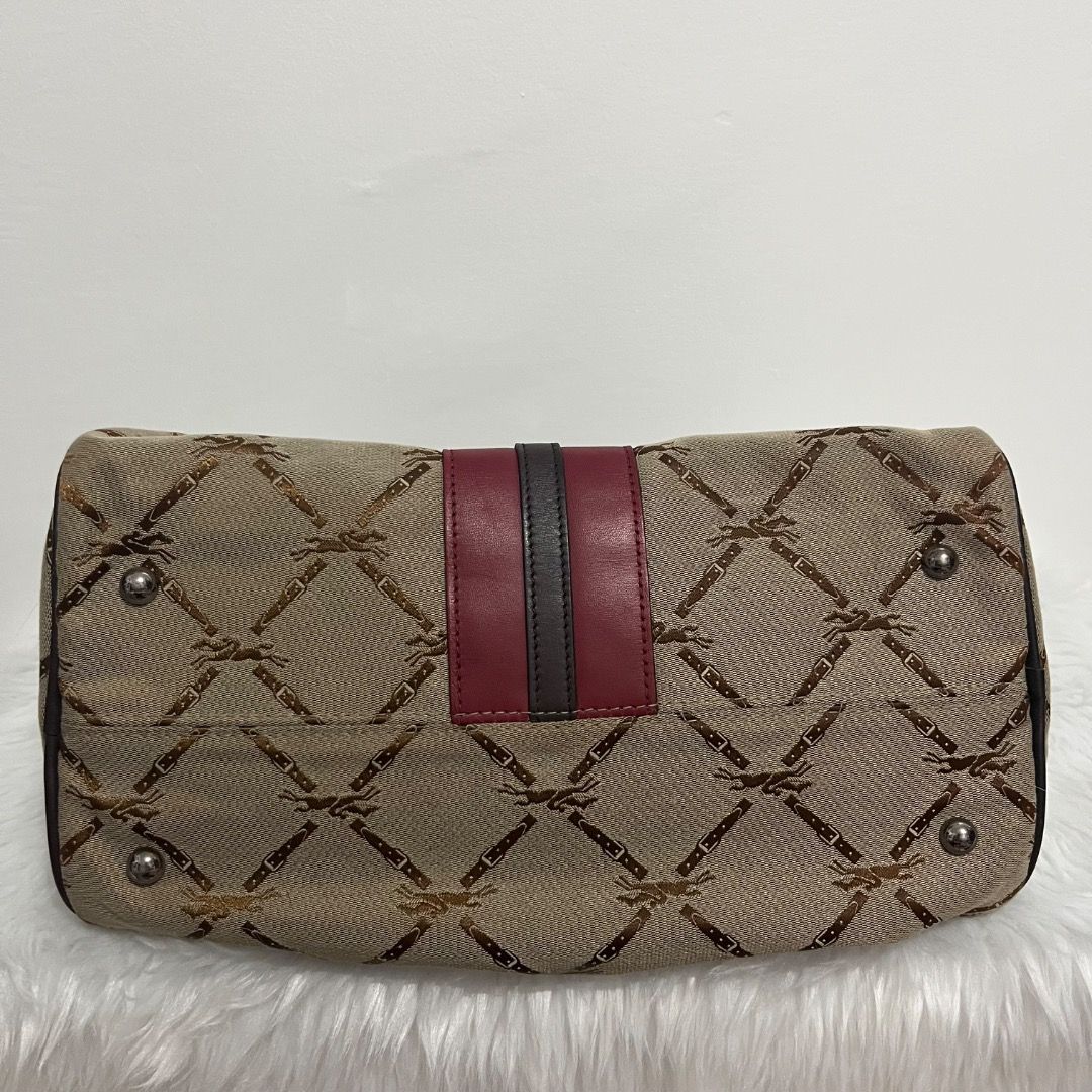 Preloved Authentic Longchamp LM Jacquard Handle Bag (Category: Luxury Bags & Wallets) located in Caloocan City. Submitted by peanutbutter23_562 (Listing ID 1452198914, Image 3). Description: Brand: Longchamp Paris Model: LM Jacquard Handle Bag Style: Boston / Bowling Bag (rectangular duffle/doctor’s bag) Material: Jacquard Canvas with Genuine Leather Trim (with center leather accent) and Handles Hardware: Silvertone with engraved “Longchamp” Aver