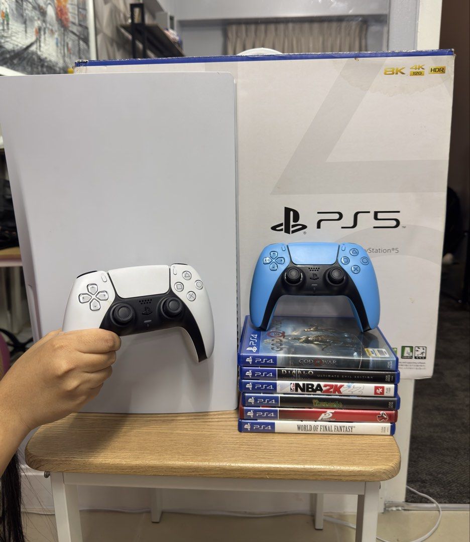 PS5 Phat 825gb with 2 controllers and 6 PS4 games + box (Category: PlayStation) located in Pasig City. Submitted by robbiseraphin (Listing ID 1452317700, Image 1). Description: 🎮 Selling: PS5 Phat 825gb Disc version with 2 dualsense controllers and 6 PS4 games + box ✅ Inclusives: - PS5 Phat 825gb (never been opened or repaired) - latest firmware - 2 dualsense controllers (white and light blue) - 6 PS4 games (can swap for other ps4 games na avail