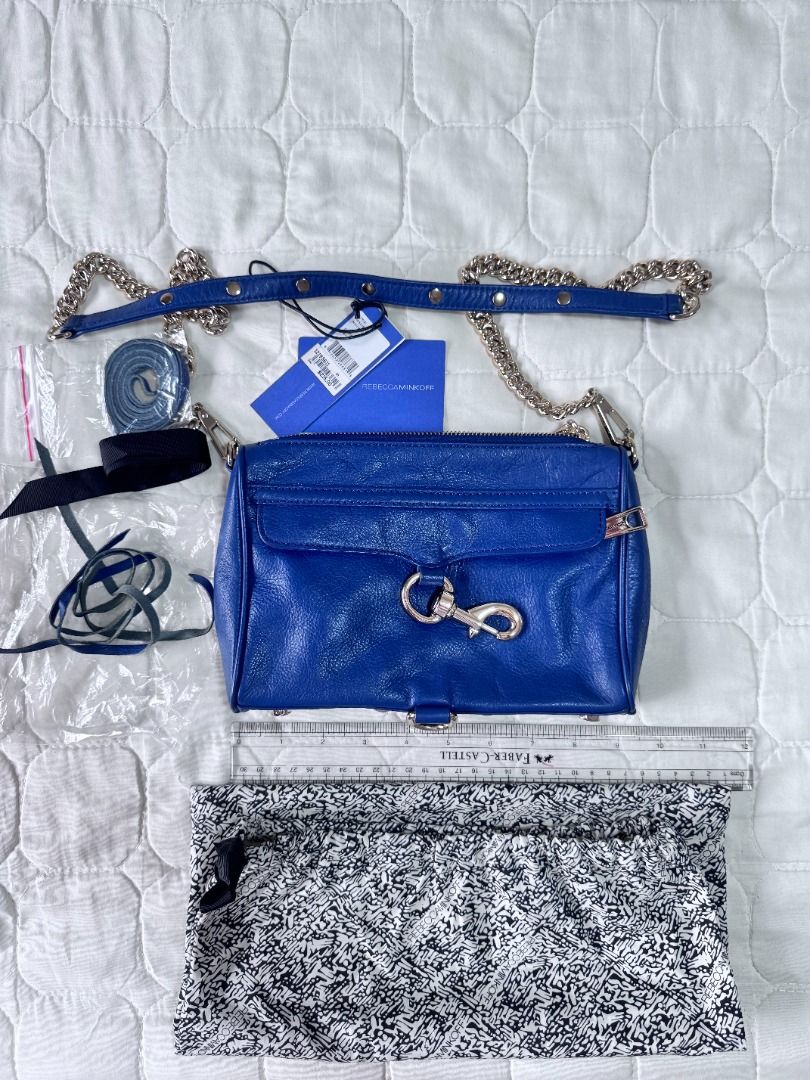 Rebecca Minkoff Navy Mini MAC Complete (Category: Luxury Bags & Wallets) located in Makati City. Submitted by mbrtom (Listing ID 1452180089, Image 1). Description: Purchased in the US. Complete with tags and dustbag. Slight stains inside zipper area. Very nice soft leather and shade of blue /periwinkle. Unused tassles included. .