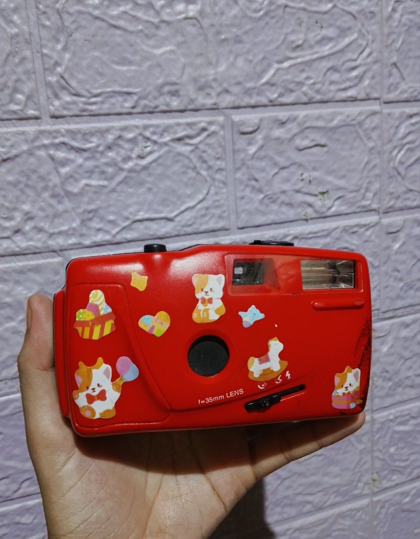 Red 35mm Focus-Free Film Camera (Category: Cameras) located in Manila. Submitted by wisemountain_82ec7b (Listing ID 1452203624, Image 1). Description: Selling this lightweight, vintage-style red 35mm film toy camera. It features an easy-to-use, focus-free lens—perfect for beginners, students, or anyone who wants a simple, vintage point-and-shoot experience without complex settings! ✨ Features & Key Details:Film Format: Uses standard 35mm film (re