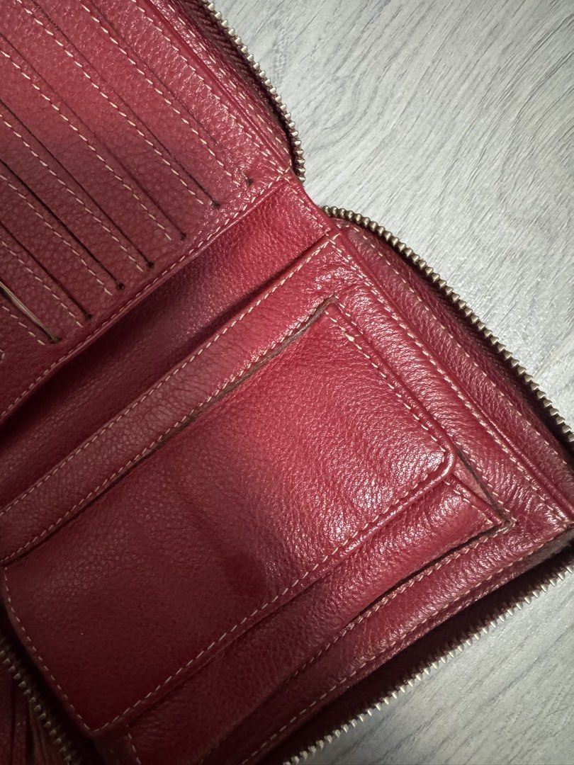 Red Leather Zip Around Wallet with Tassel (Category: Wallets & Card holders) located in Bulacan. Submitted by argene (Listing ID 1452266400, Image 3). Description: - Genuine red leather wallet - Secure zip-around closure - Stylish tassel zipper pull - Multiple interior card slots and compartments - Excellent for organizing your essentials - Can pass as brandnew -Super nice in actual.