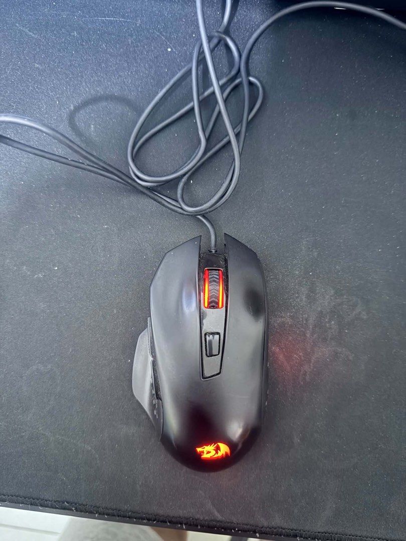 Redragon Wired Gaming Keyboard & Mouse (Category: Computer Keyboard) located in Paranaque City. Submitted by bananamaeee (Listing ID 1452133477, Image 2). Description: - RedragonWired Gaming Keyboard - Full-sized with numeric keypad - Vibrant RGB lighting - Redragon Ergonomic RGB Gaming Mouse - Comfortable design for extended use - Both devices are wired - Ideal for gaming and everyday computing.