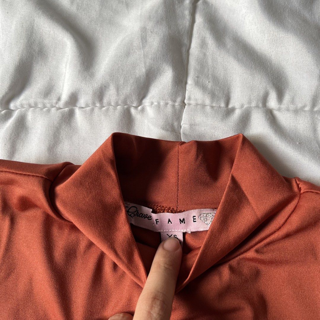 Rust High Neck Bodysuit (Category: Others Tops) located in Davao. Submitted by byeooool (Listing ID 1452225163, Image 3). Description: - bought from macy's in the states - xs on tag but can fit up to small - double lined - stretchable - never been used rfs: not my style.