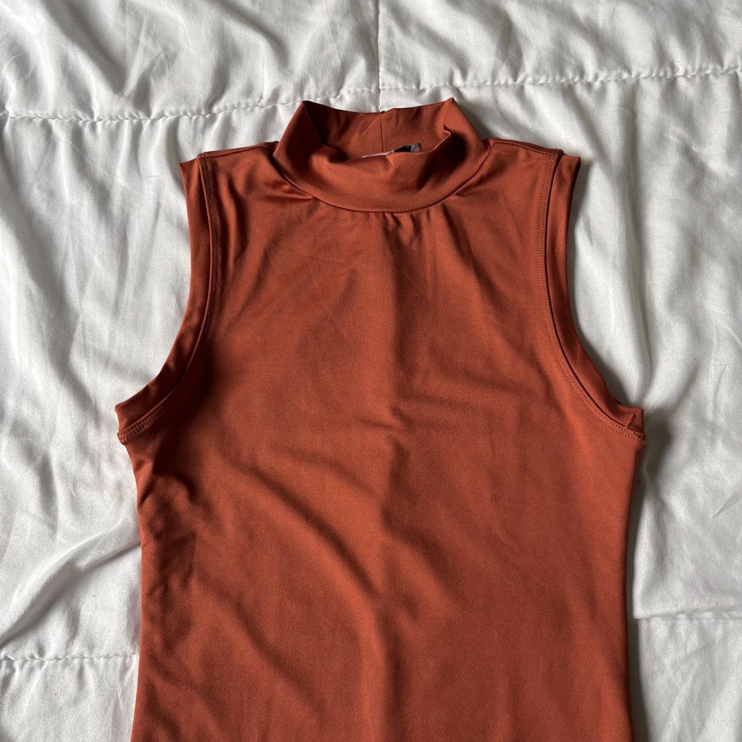 Rust High Neck Bodysuit (Category: Others Tops) located in Davao. Submitted by byeooool (Listing ID 1452225163, Image 2). Description: - bought from macy's in the states - xs on tag but can fit up to small - double lined - stretchable - never been used rfs: not my style.