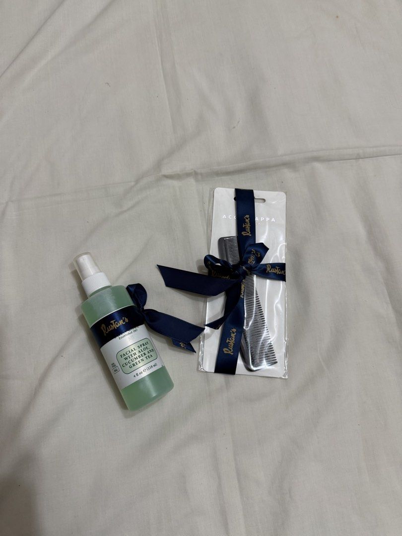 Rustan's Facial Spray & Comb Set (Category: Face Care) located in Makati City. Submitted by haggleandshop (Listing ID 1452317587, Image 1). Description: - Rustan's Facial Spray (4 fl oz / 118 ml) - Infused with Aloe, Cucumber, and Green Tea - Includes a set of two Rustan's combs - Combs are tied with a navy ribbon - Makes a great gift set.