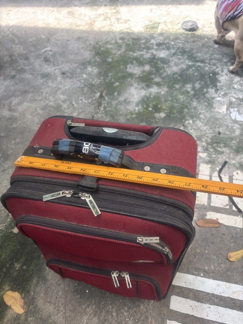 (Samsonite)Samsonite Red Rolling Suitcase Luggage (Category: Luggage) located in Pasig City. Submitted by lhengay (Listing ID 1452168872, Image 3). Description: - Red Samsonite rolling suitcase - Two front zippered pockets - Main compartment - Extendable and retractable handle - Intact wheels - Minor exterior and handle wear consistent with travel - Ideal for short trips or carry-on luggage.