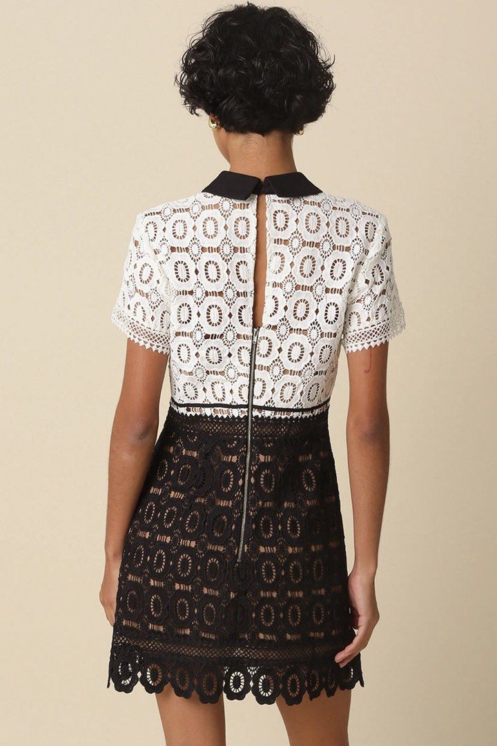 Self-Portrait Lace Contrast Collared Mini Dress (Category: Dresses) located in Cebu City. Submitted by stylingtrends.coll (Listing ID 1452142780, Image 3). Description: - Thick and heavy - Color: Black and white lace overlay - Style: Short sleeves, collared neckline - Closure: Ykk back zipper - Occasion: Ideal for events and parties Size: XS.