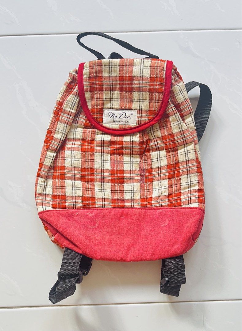 Small backpack / red backpack / backpack (Category: Backpacks) located in Singapore. Submitted by sghomeclothes123 (Listing ID 1452236346, Image 1). Description: Red checkered backpack.