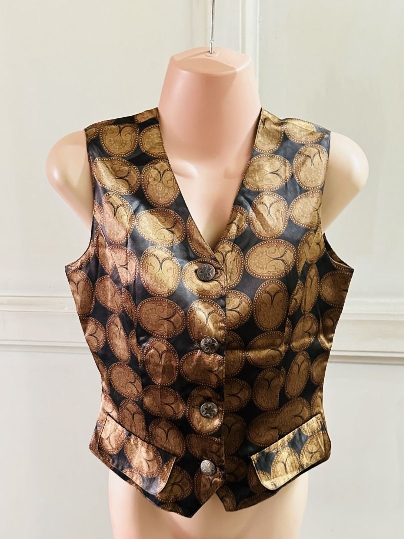 Small satin Black and Gold Patterned Vest non sleeve button down (Category: Vests) located in Cebu City. Submitted by annaincebu (Listing ID 1452246807, Image 1). Description: 👕 ✅ MEASUREMENTS: Length: 19 inches Width: 17 inches 📦 DELIVERY: Maxim COD (for within Cebu) or LBC or JRS Express (outside Cebu) ✅ NOTES: - Unique black and gold oval pattern vest - Button-front closure - Two front pockets - Ideal for layering over shirts or dresses.