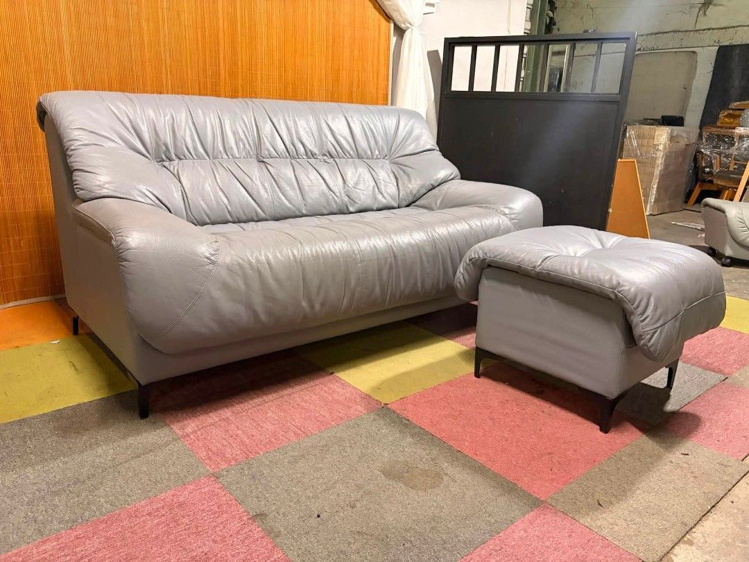 Sofa (Category: Sofas) located in Meycauayan. Submitted by marygracecasimiro (Listing ID 1452147422, Image 3). Description: Modern-Retro Gray Leather Sofa with Ottoman SUPER COMFY!!! THICK LEATHER FABRIC!!! RETRO VIBES!!! NO ISSUES!!! FLAWLESS!!! Price : 19,500 ✅ *SEE VIDEO COMMENT Sofa : 61L x 34W x 18H seat height inches Sandalan height 32 inches Ottoman : 29L x 19W x 18H inches In VERY good condition 💜💜.