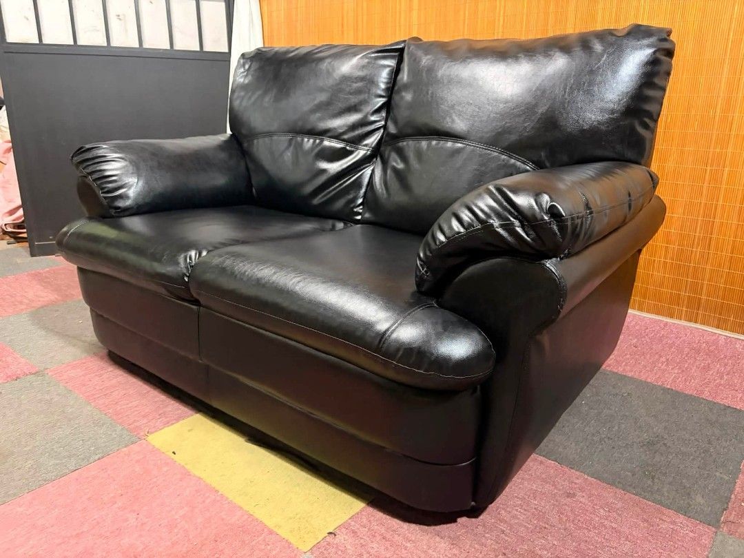 Sofa (Category: Sofas) located in Meycauayan. Submitted by marygracecasimiro (Listing ID 1452211234, Image 3). Description: Black Bulky Leather Couch / 2-Seater Sofa SUPER SOFT AND COMFY!!! THICK LEATHER!!! Price : 12,900 ✅ In VERY good condition💜💜.
