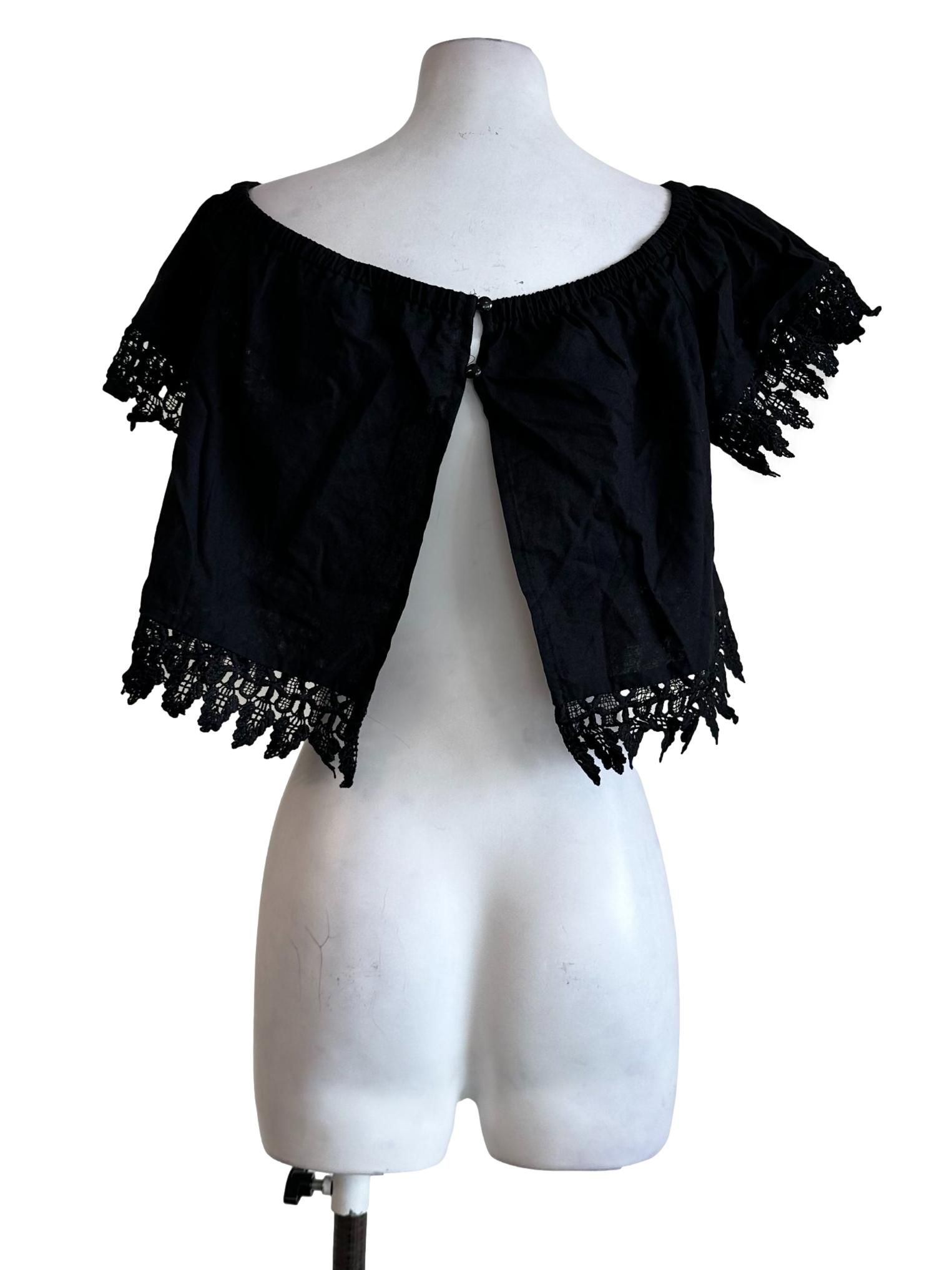Something Borrowed Black Embroidered Pattern Top (Category: Other Tops) located in Kuala Lumpur. Submitted by refashmy (Listing ID 1452231444, Image 2). Description: [Brand] Something Borrowed [Description] Non Padded Bust Functional Buttons No Pockets [Measurements] Size S PTP - 17'' Waist - '' Length - 15'' [Condition] Please allow 0.5-1 inch difference in our given measurements. Any variance within this range may not be considered as a reason 