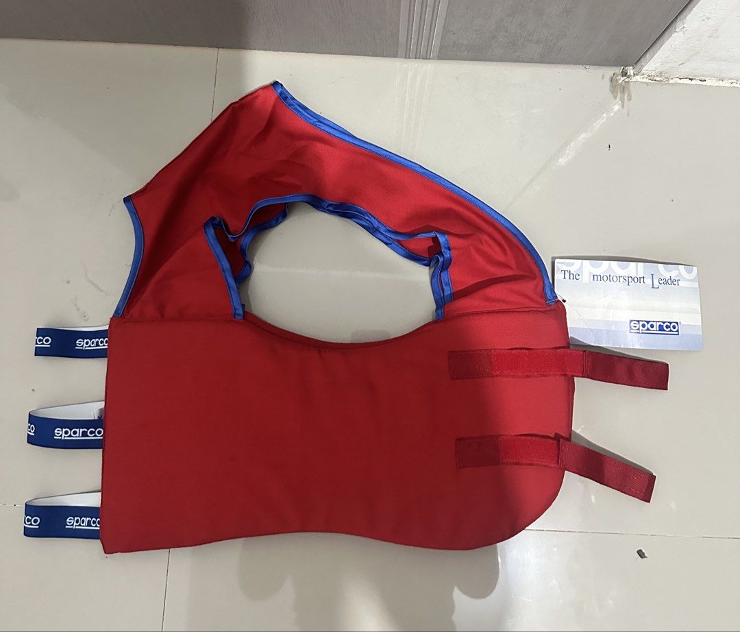 Sparco Red Life Vest (Category: Vests) located in Digos. Submitted by reywearfinds (Listing ID 1452132908, Image 2). Description: - Sparco Life Vest - Color: Red with Blue Trim - Features: Adjustable straps with velcro closure - Ideal for: Water sports and boating - Condition: Please check photos for details - Inquiries: Feel free to ask questions.