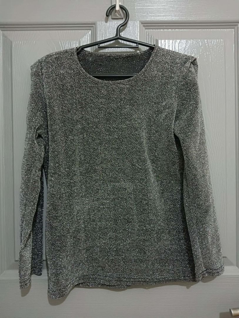Sparkly Silver Long-Sleeved Top (Category: Longsleeves) located in Quezon City. Submitted by trollieshop (Listing ID 1452294285, Image 1). Description: Size: Small to Medium - Sparkly silver long-sleeved top - Ideal for parties or a night out - Features a nice shimmer - Round neckline - Long sleeves.