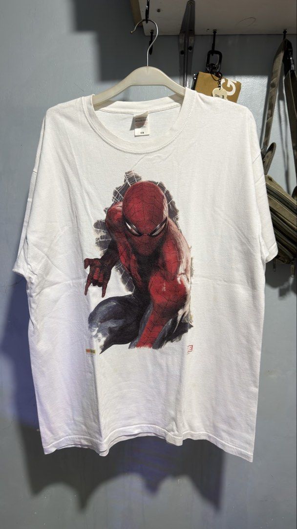 Spiderman Promo Tee shirt by Panini Comics (Category: Tshirts & Polo Shirts ) located in Manila. Submitted by goodhumanbeing (Listing ID 1452311683, Image 1). Description: Panini Comics promo tee - Marvel Spiderman 23x29 Yellow stains and lints.