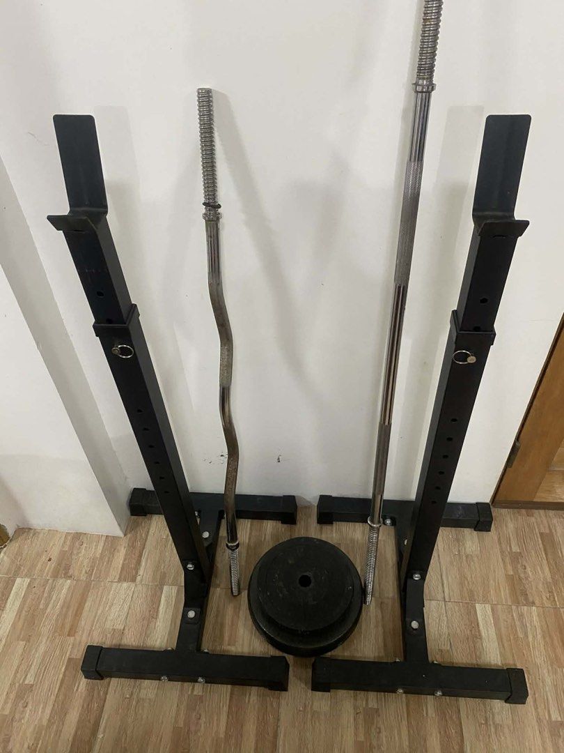 Squat Rack, Barbells, and Weight Plates (Category: Weights & Dumbbells) located in Quezon City. Submitted by marceline_am (Listing ID 1452286208, Image 2). Description: Adjustable squat rack 1 curl bar 1 5ft barbell bar 2 25 lbs plates 2 15 lbs plates.