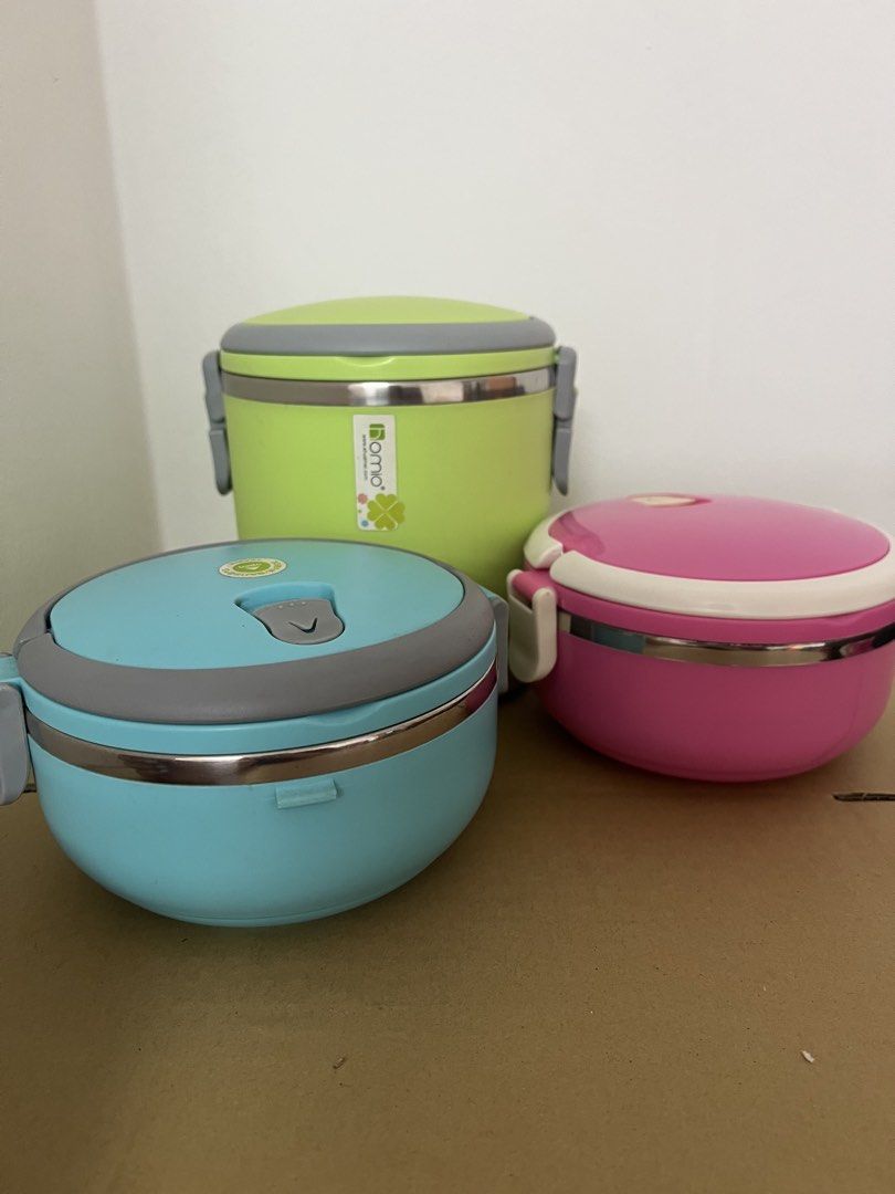Stackable Insulated Lunch Boxes (Category: Food Organisation & Storage) located in Puchong. Submitted by mickeymouse_collections (Listing ID 1452200919, Image 2). Description: Selling stackable lunch boxes. Comes in bright colors: lime green, light blue, and pink. The lime green one is taller and cylindrical. The other three are round and stackable. Stainless steel interior. Great for packing meals on the go..