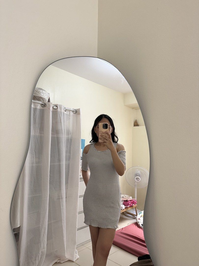 Striped Cold Shoulder Mini Dress (Category: Dresses) located in Manila. Submitted by kathsclosetmnl (Listing ID 1452250163, Image 1). Description: -Small to Medium - Cute striped mini dress - Cold shoulder design with short sleeves - Stretchy material for a flattering fit - Ruffled hem detail - Versatile for casual outings or nights out - Pairs well with sneakers or heels.