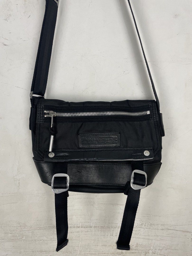 Though Jeansmith 2-Way Nylon Shoulder Bag Black (Category: Sling Bags) located in Manila. Submitted by rdtp2 (Listing ID 1452121783, Image 2). Description: - Issue: Small scratch sa leather part bandang baba - Color: Black - Material: Durable nylon with leather accents - Features: Multiple zippered compartments for organization - Strap: Adjustable shoulder strap for comfortable carrying - Ideal for: Daily use or travel - Condition: Please check p